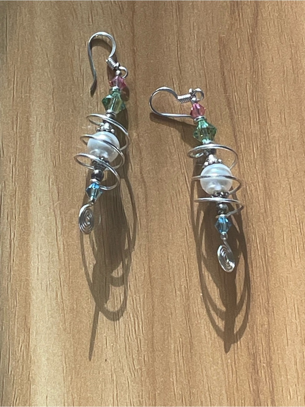 Silver Spiral Drop Earrings with White Pearl and Green Accents